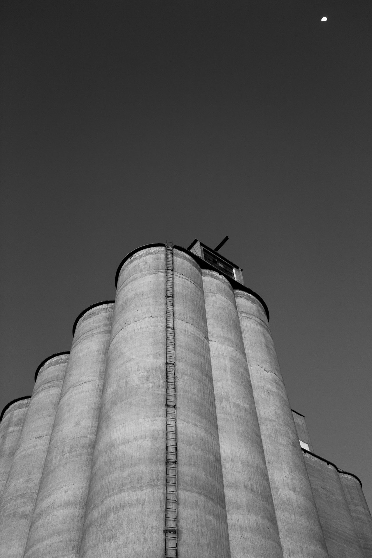 concrete silo in black and white.