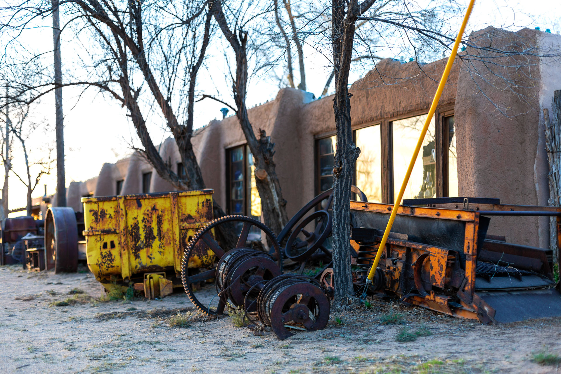 old equipment outside of house.